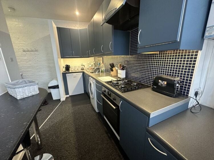 Dual Income Commercial Property with Apartment in Buxton, Near Peak District Photo 1
