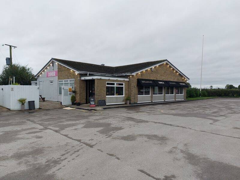 Roadside restaurant / showroom TO LET (Freehold also available) with ample parking, near York. Photo 1