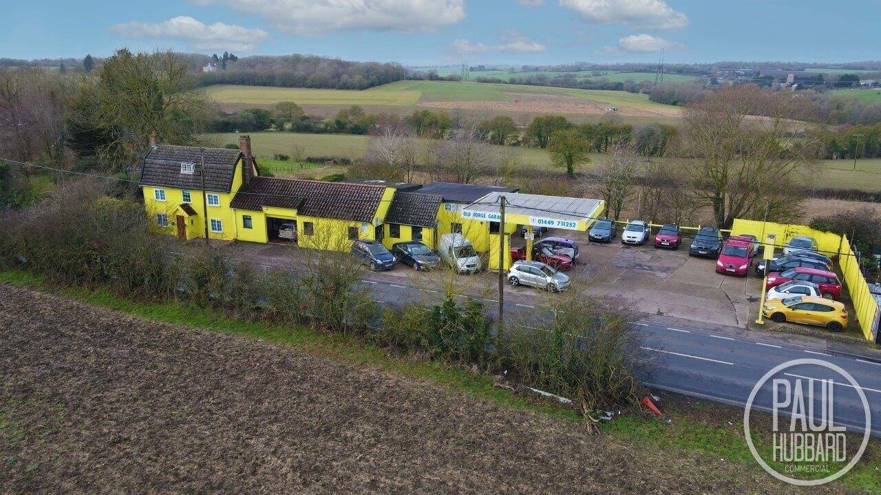 Prime Commercial Property with MOT Station, Workshop, Forecourt, and Cottage in Earl Stonham, Suffo Photo 1