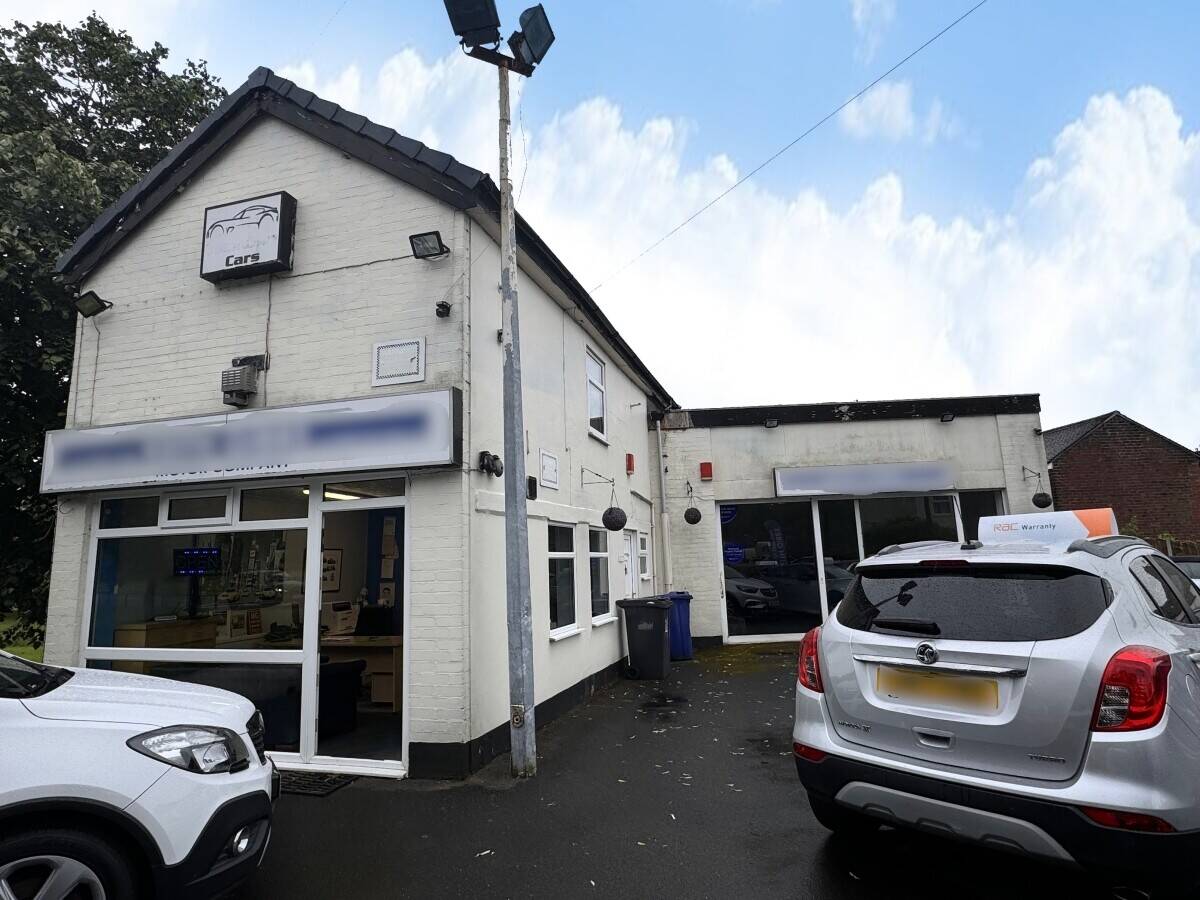 Vacant Mixed-Use Property with Showroom, Office, Flat, and Parking in Wolstanton, Staffordshire Photo 1