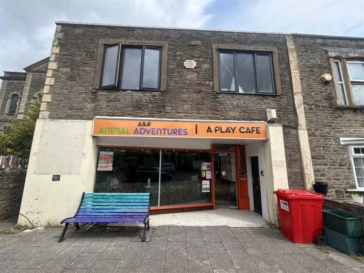 A ground floor retail unit of approximately 690 ft² arranged as an open plan shop area with rear storage, kitchenette and wc. Photo 1