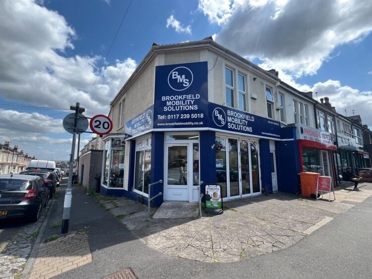 Mixed-use property in Bristol with ground floor shop, workshop, and 2-bedroom flat above Photo 1