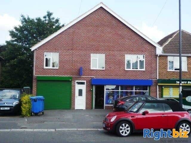 Derbyshire Freehold Property with Shop and Two Flats on Sale! Photo 1
