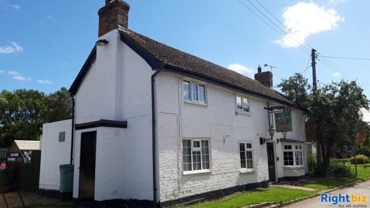 Charming Village Pub with Owner Accommodation in Oxfordshire/Buckinghamshire for Sale Photo 1