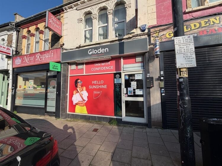 A ground floor retail unit extending to approximately 750 sq ft, most recently trading as a tanning salon. Photo 1