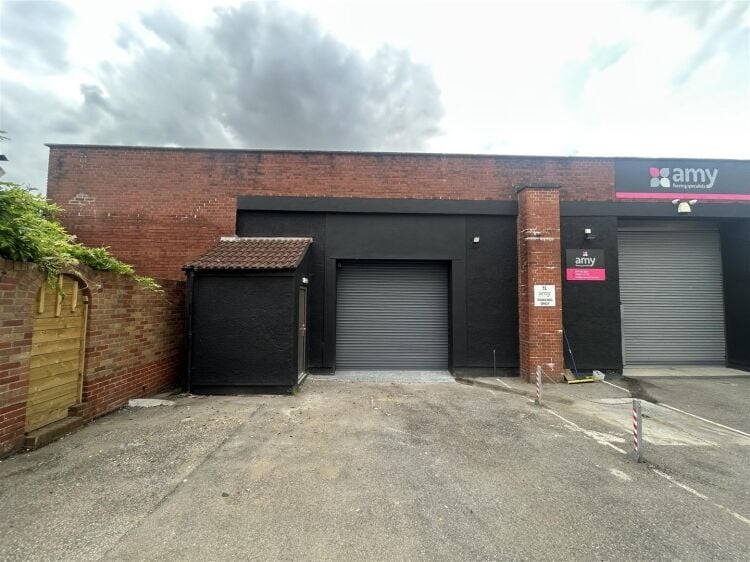 Light industrial unit extending to approximately 1,612 sq ft, configured to provide predominantly open plan workshop accommodation complemented by a s Photo 1