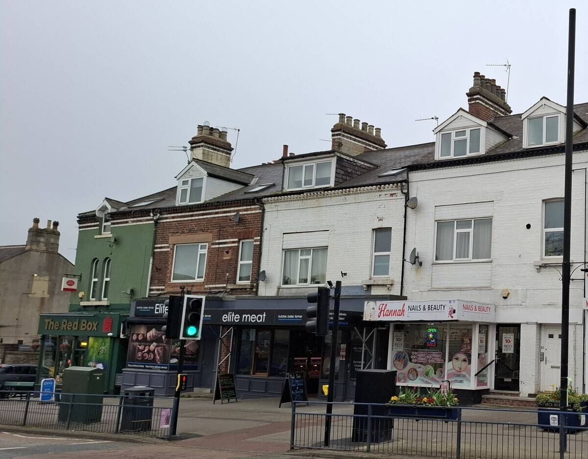 Mixed-use property in Harrogate North Yorkshire with rental income and established tenants Photo 1