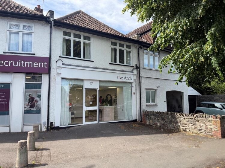 Mixed-use investment property with ground floor shop and two-bedroom flat in Bristol Photo 1