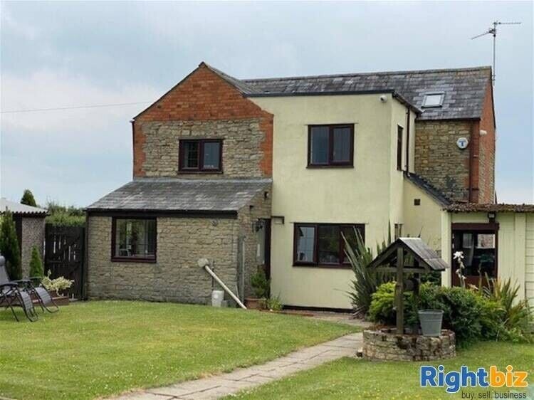 Spacious Four-Bedroom House with Profitable Kennel and Cattery Business in Buckinghamshire Photo 1