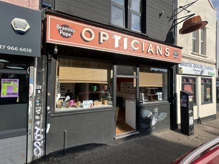 Ground floor retail unit in Bedminster, Bristol leased to an optician on a 10-year term Photo 1