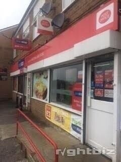 Prime Investment Opportunity in Bradford with Retail Unit, Two Flats and Garage Photo 1