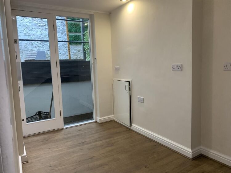 A very well presented retail unit of approximately 770 ft² arranged over two floors benefiting from a further terrace to the rear. the shop is ar Photo 10