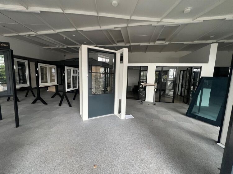 A large showroom of approximately 5,340 ft² with forecourt parking and a large, enclosed yard to the rear. the unit is situated in mangotsfield, Photo 10