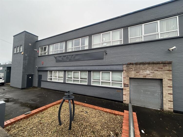 A ground floor office of approx 1,500 ft² with additional toilet facilities. the property benefits from allocated parking, security shutters, and Photo 10