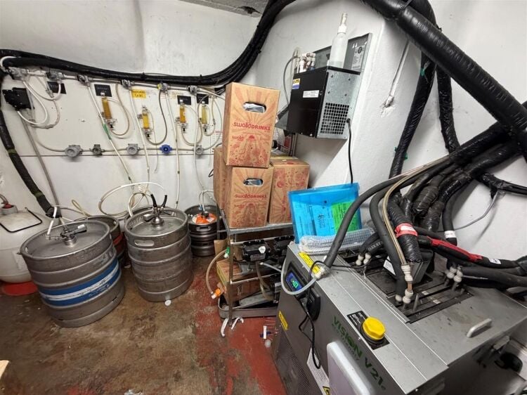 A fully fitted restaurant/bar extending to approximately 1,580 ft² benefiting from a fully equipped commercial kitchen, enclosed rear garden, and Photo 10