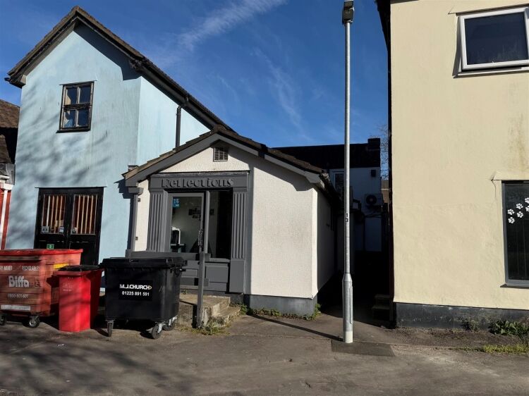 An extended two-storey retail premises located in the town centre, let to reflections hair salon at £32,000 per annum on a 10-year fully repairin Photo 10
