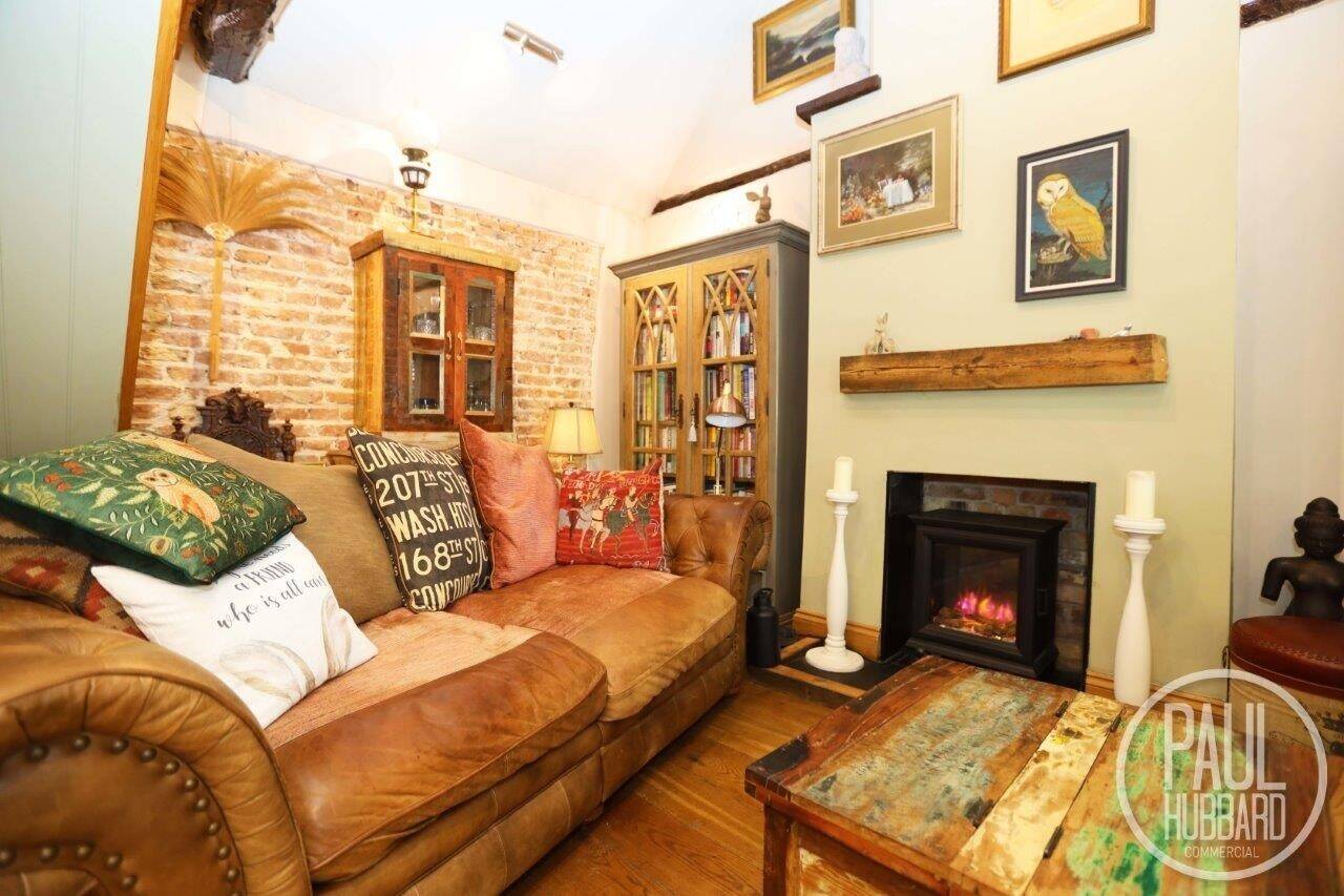 Grade II Listed Mixed-Use Property with Three Units in Historic Downham Market Photo 11