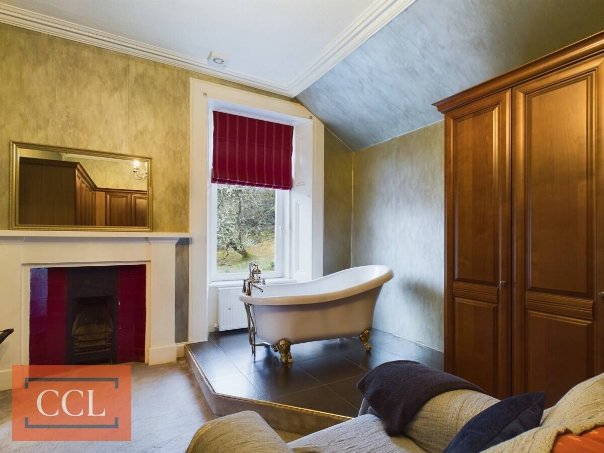 Victorian Charm Meets Modern Comfort in Expansive Lochwood House For Sale Photo 11