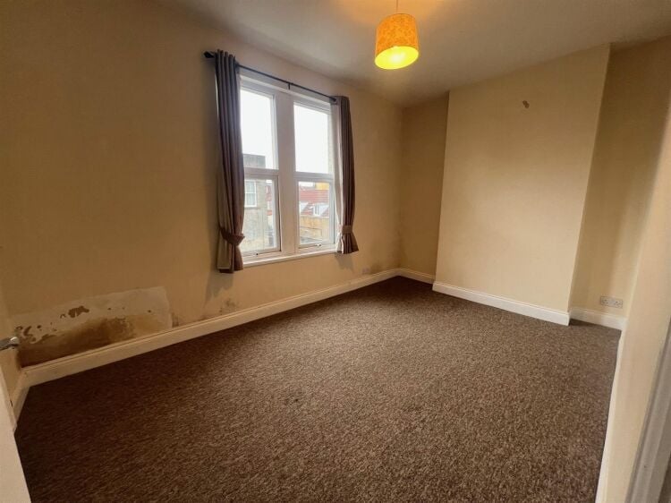 Mixed-use property in Bristol with ground floor shop, workshop, and 2-bedroom flat above Photo 11