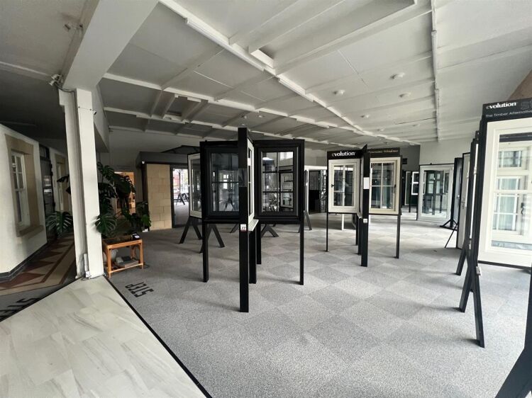 A large showroom of approximately 5,340 ft² with forecourt parking and a large, enclosed yard to the rear. the unit is situated in mangotsfield, Photo 11
