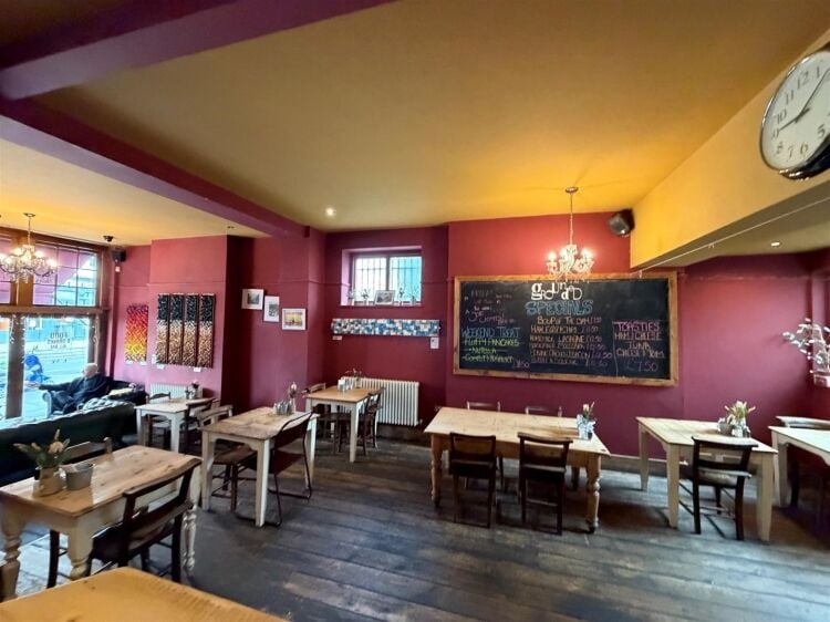 A fully fitted restaurant/bar extending to approximately 1,580 ft² benefiting from a fully equipped commercial kitchen, enclosed rear garden, and Photo 11