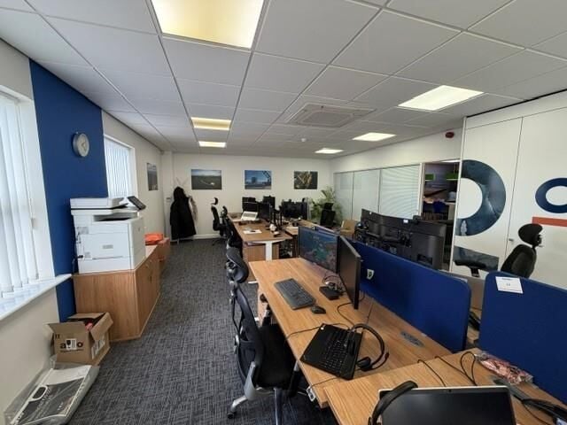 A modern semi detached office of approximately 2,272 ft² (211m²) arranged over two floors, with additional toilets, shower and reception lo Photo 11