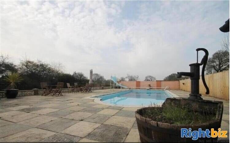 Renovated Surrey Boarding Kennels with Spacious Detached Family Home on 4.5 Acres Photo 11