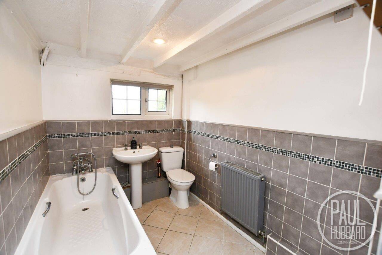Prime Commercial Property with MOT Station, Workshop, Forecourt, and Cottage in Earl Stonham, Suffo Photo 12