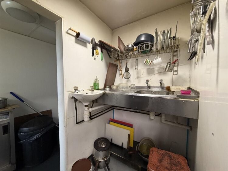 A fully fitted takeaway premises extending to approximately 876 sq ft. Photo 12