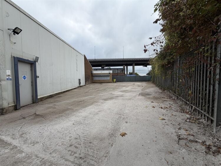 An end of terrace industrial unit measuring approximately 5,886 sq ft (546.8 sq m). the unit benefits from a spacious yard to the side and front provi Photo 12
