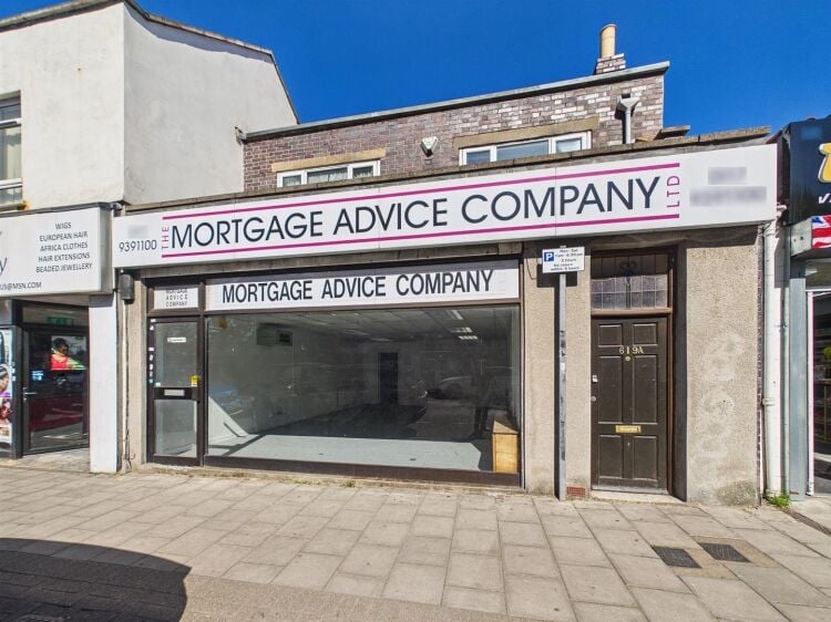 A large mixed-use investment property arranged as a ground floor shop (of approx. 740 ft²) with a large and self contained 2 bedroom flat above a Photo 13