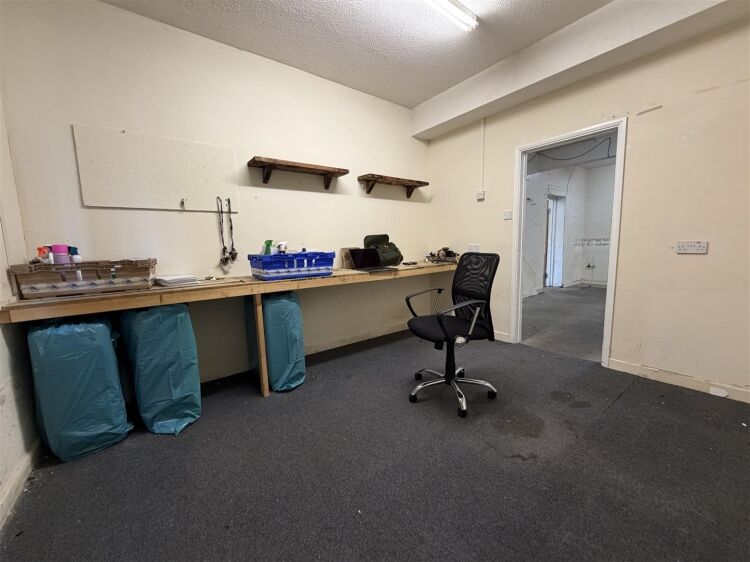 The property comprises a substantial retail unit extending to approximately 3,526 sq ft. Photo 13