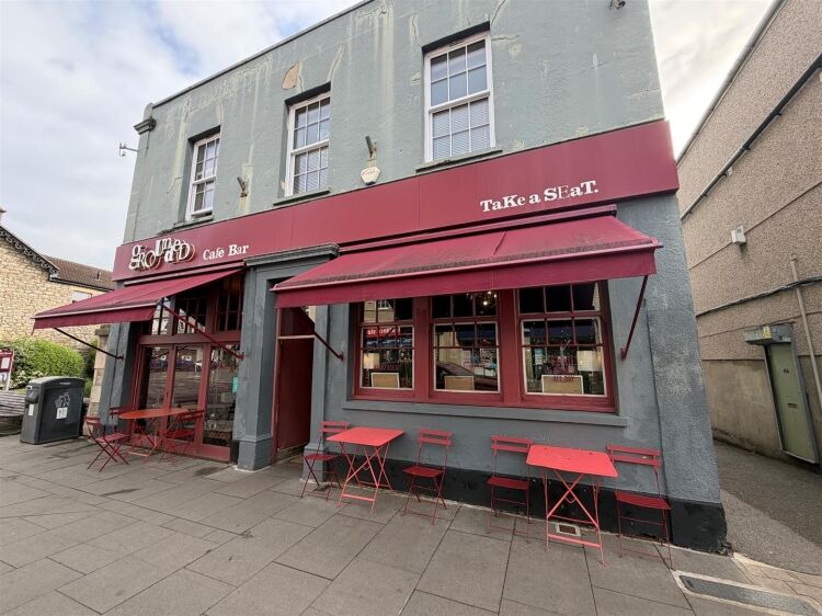 A fully fitted restaurant/bar extending to approximately 1,580 ft² benefiting from a fully equipped commercial kitchen, enclosed rear garden, and Photo 14