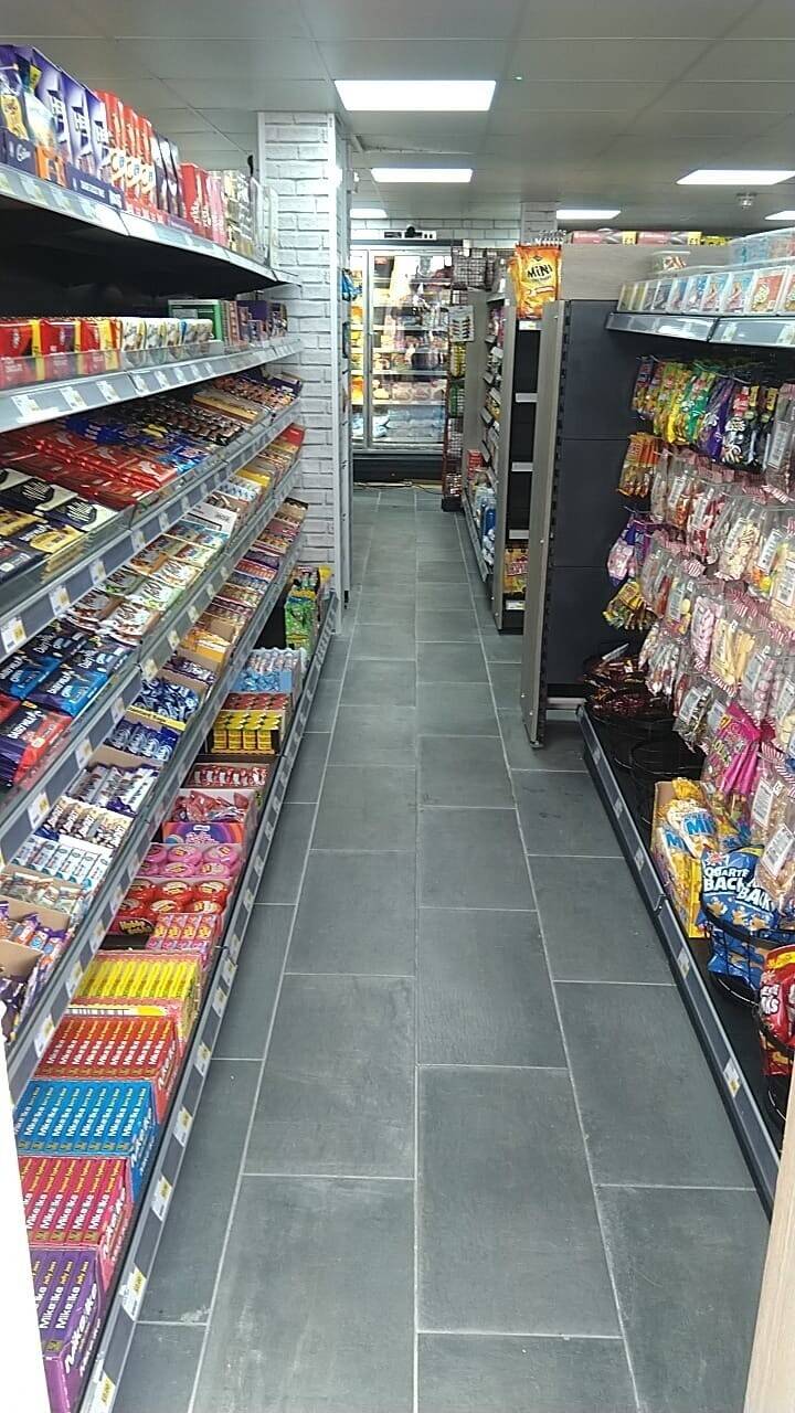 Prime Commercial Property in Powys, Wales - Village Shop with Large Flat, No Competition Photo 2