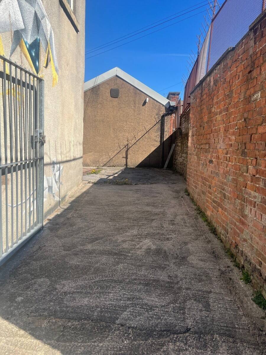 Secure Freehold Commercial Space with Yard and Off-Street Parking in Blackburn Photo 2