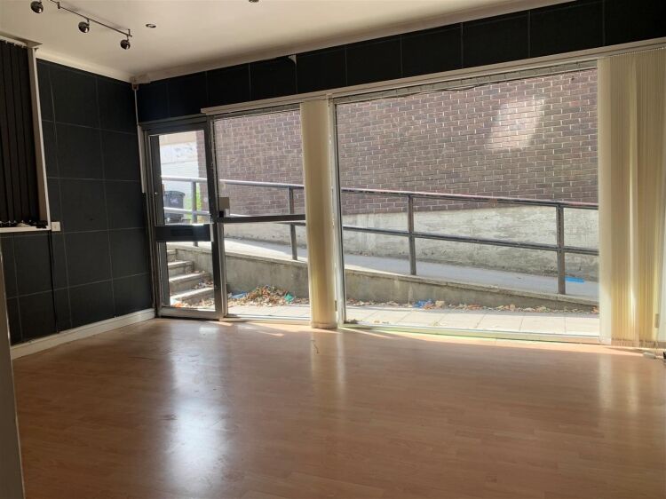 A ground floor retail unit of approximately 925 sq ft, located on hollway road, stockwood. the premises comprises an open plan front and rear shop are Photo 2