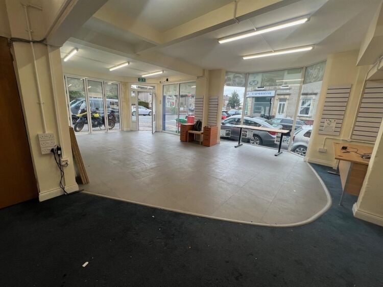 Mixed-use property in Bristol with ground floor shop, workshop, and 2-bedroom flat above Photo 2