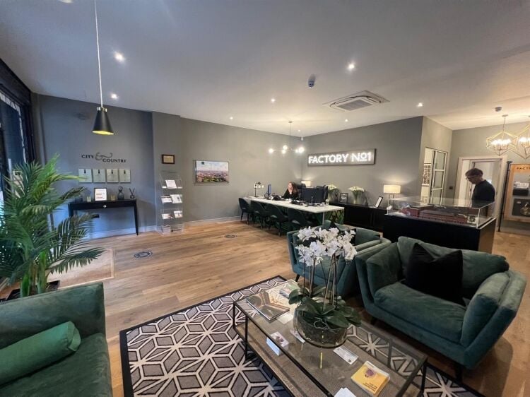A modern retail unit of approximately 1,049 ft² situated in a busy trading position in imperial arcade, part of the city & country factory no. 1 Photo 2