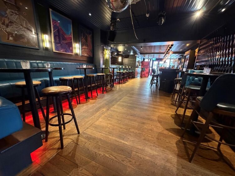 A fully fitted bar of approximately 1,035 ft² with additional basement stores and toilets, and an enclosed rear courtyard garden. the unit was pr Photo 2