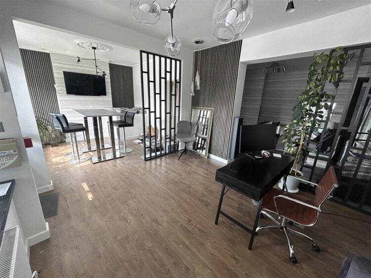 A modern ground-floor retail unit extending to approximately 957 sq ft, prominently positioned on a corner plot. the property is well-presented throug Photo 2