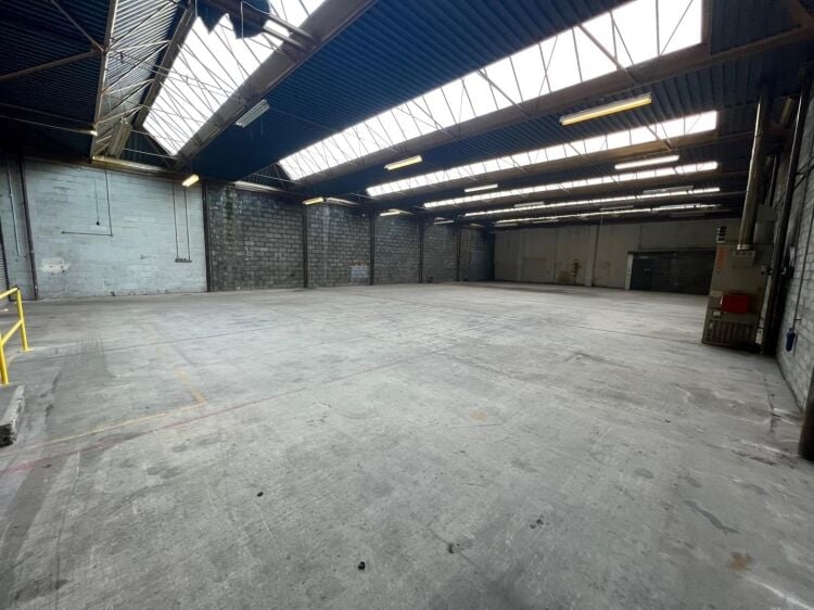 A well presented industrial unit of approximately 5,860 ft² arranged predominantly as a warehouse with ancillary offices/reception, male and fema Photo 2