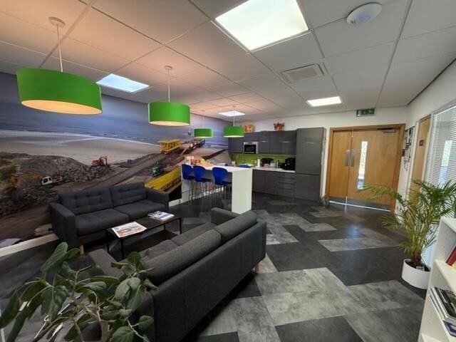 A modern semi detached office of approximately 2,272 ft² (211m²) arranged over two floors, with additional toilets, shower and reception lo Photo 2