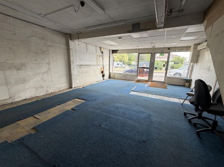 An end of terrace extended shop with first floor offices, measuring approximately 1,780 ft². the shop is situated in a highly prominent trading p Photo 2