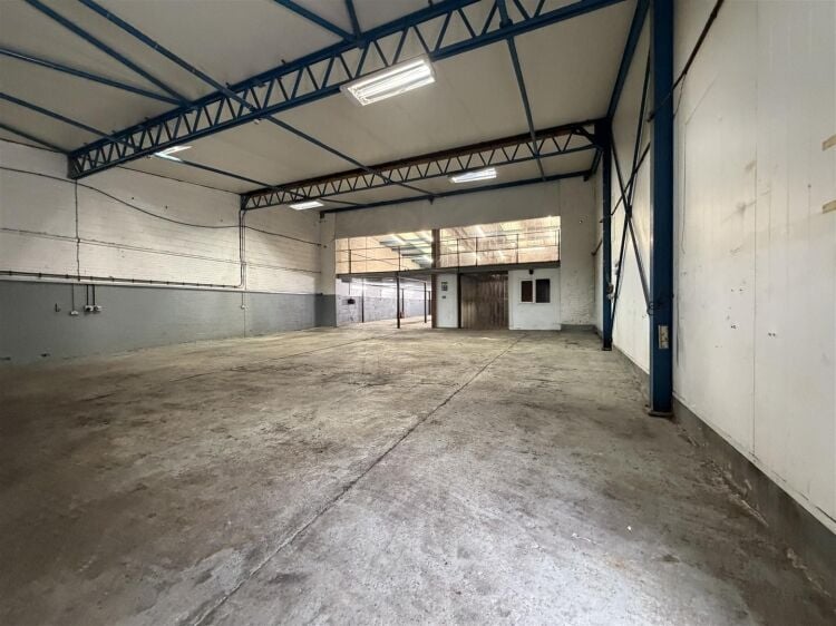 An end of terrace industrial unit measuring approximately 5,886 sq ft (546.8 sq m). the unit benefits from a spacious yard to the side and front provi Photo 2