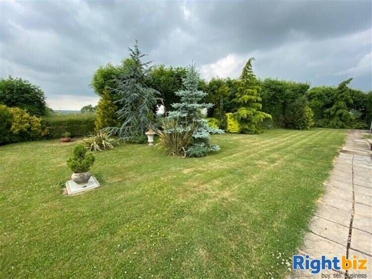 Spacious Four-Bedroom House with Profitable Kennel and Cattery Business in Buckinghamshire Photo 2