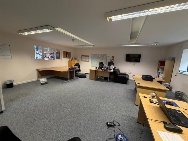 A modern light industrial unit of approximately 1,939 ft² , with further mezzanine storage of approx. 1,484 ft². the unit benefits from roll Photo 2
