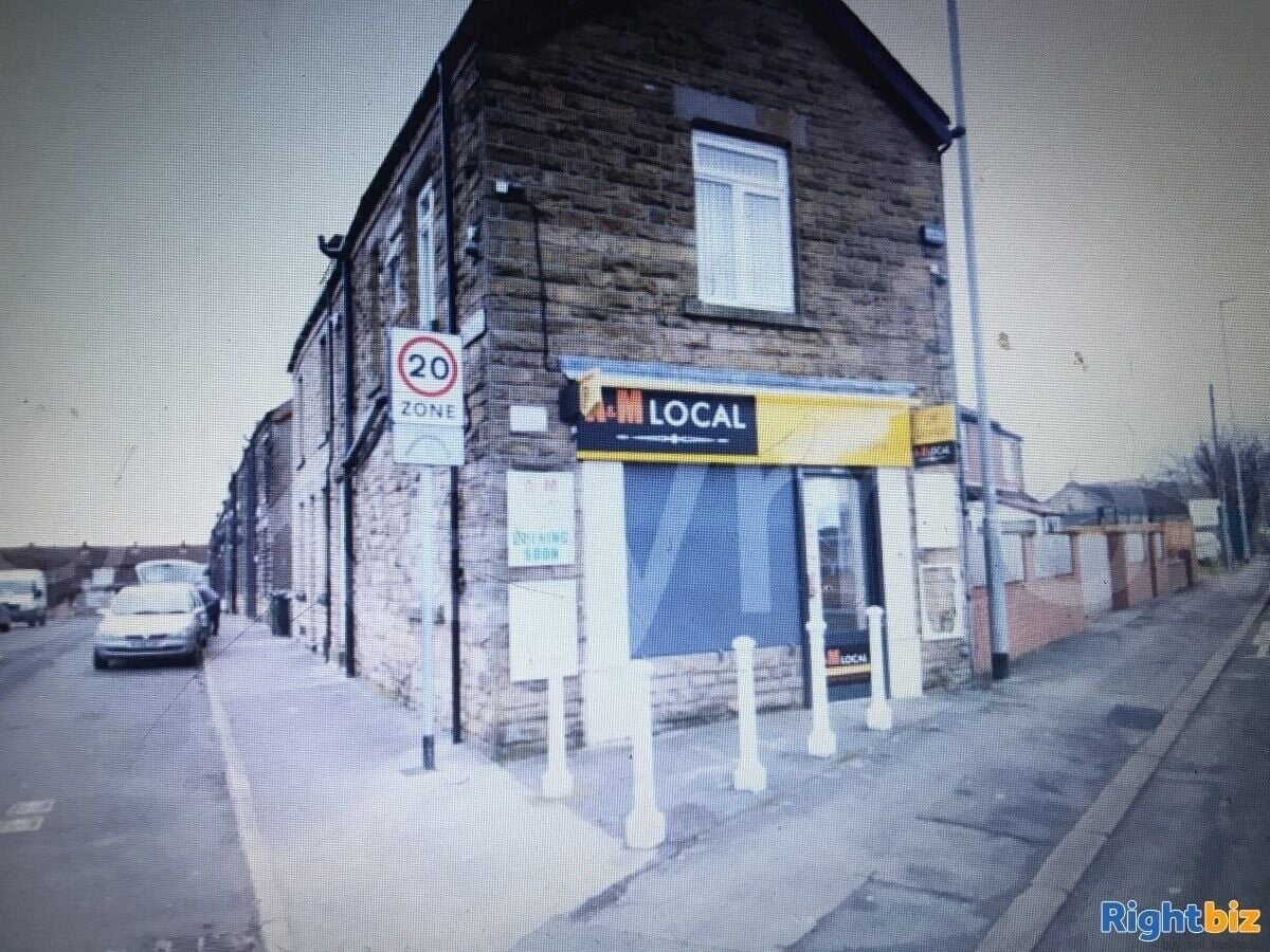 Leeds Property Alert: Freehold Shop Unit with Flat Above for Sale! Photo 2