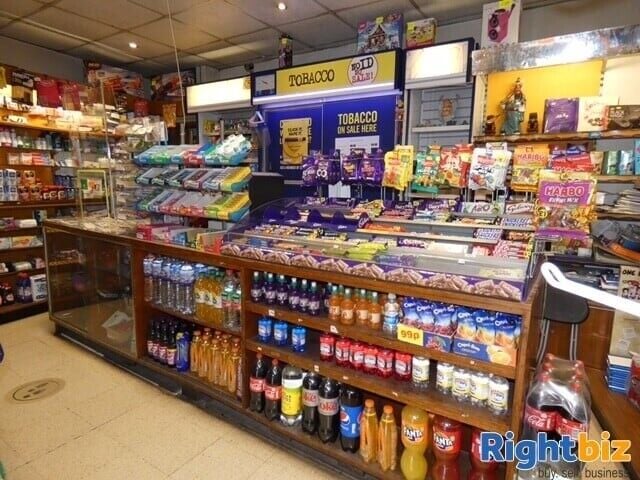 Thriving Newsagent Business with 4-Bedroom Accommodation in Oldham Manchester Photo 2