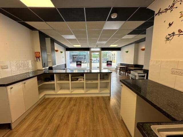 Buxton Mixed Use Property with Development Potential in Prime Shopping Area Photo 3