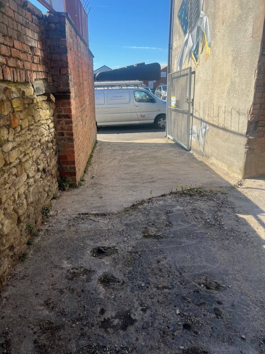 Secure Freehold Commercial Space with Yard and Off-Street Parking in Blackburn Photo 3